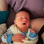 Emerson is registered to the contest to win money with this photo: arm, baby, blanket, child, clothing, comfort, cute, face, hand, indoors, infant, newborn, peaceful, person, portrait, resting, sleep, sleeping, soft, toddler