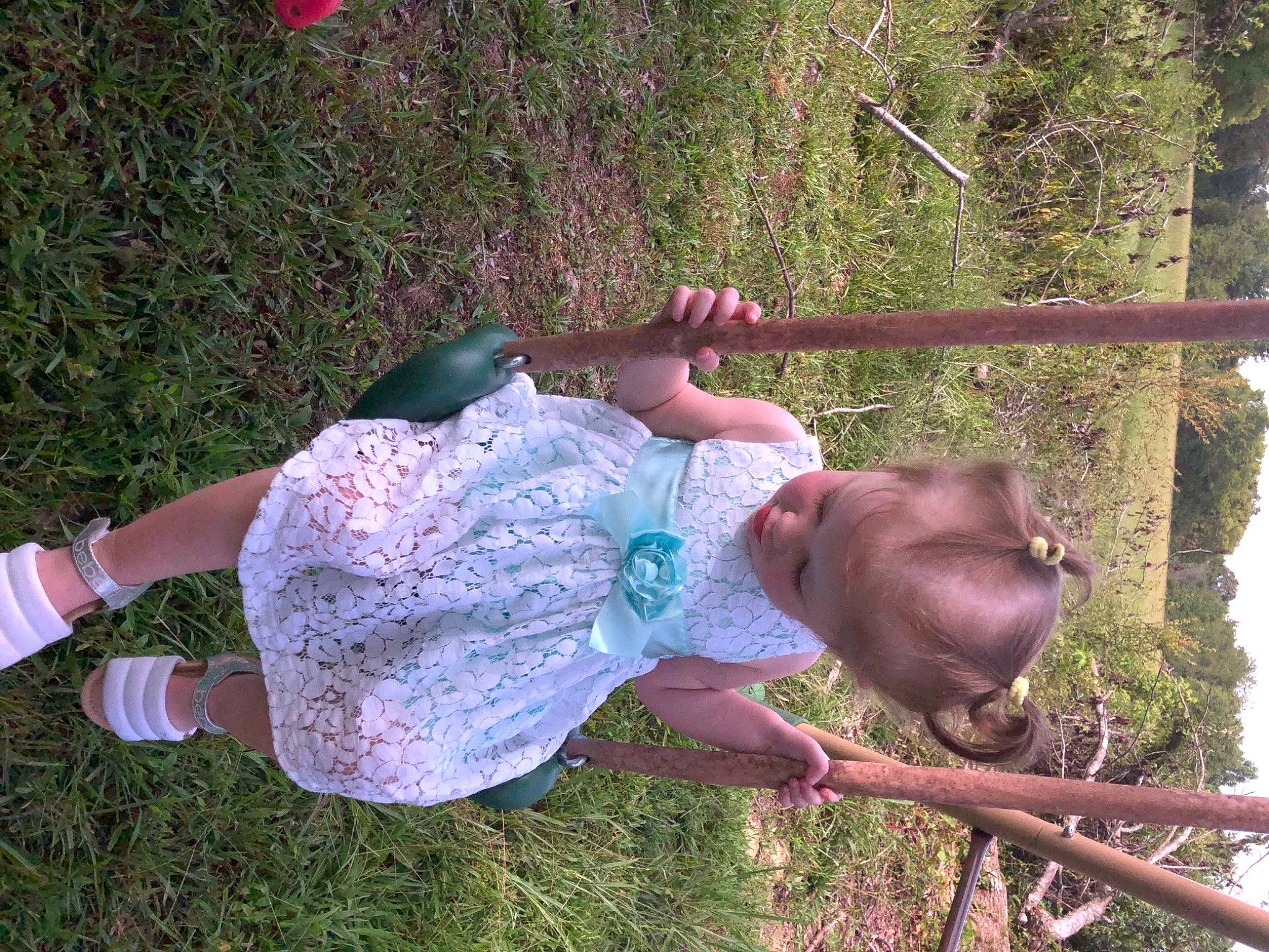 Katelyn is registered to the contest to win money with this photo: child, flesh, fun, grass, green, happy, leg, leisure, magenta, people_in_nature, person, plant, sandal, smile, toddler, tree