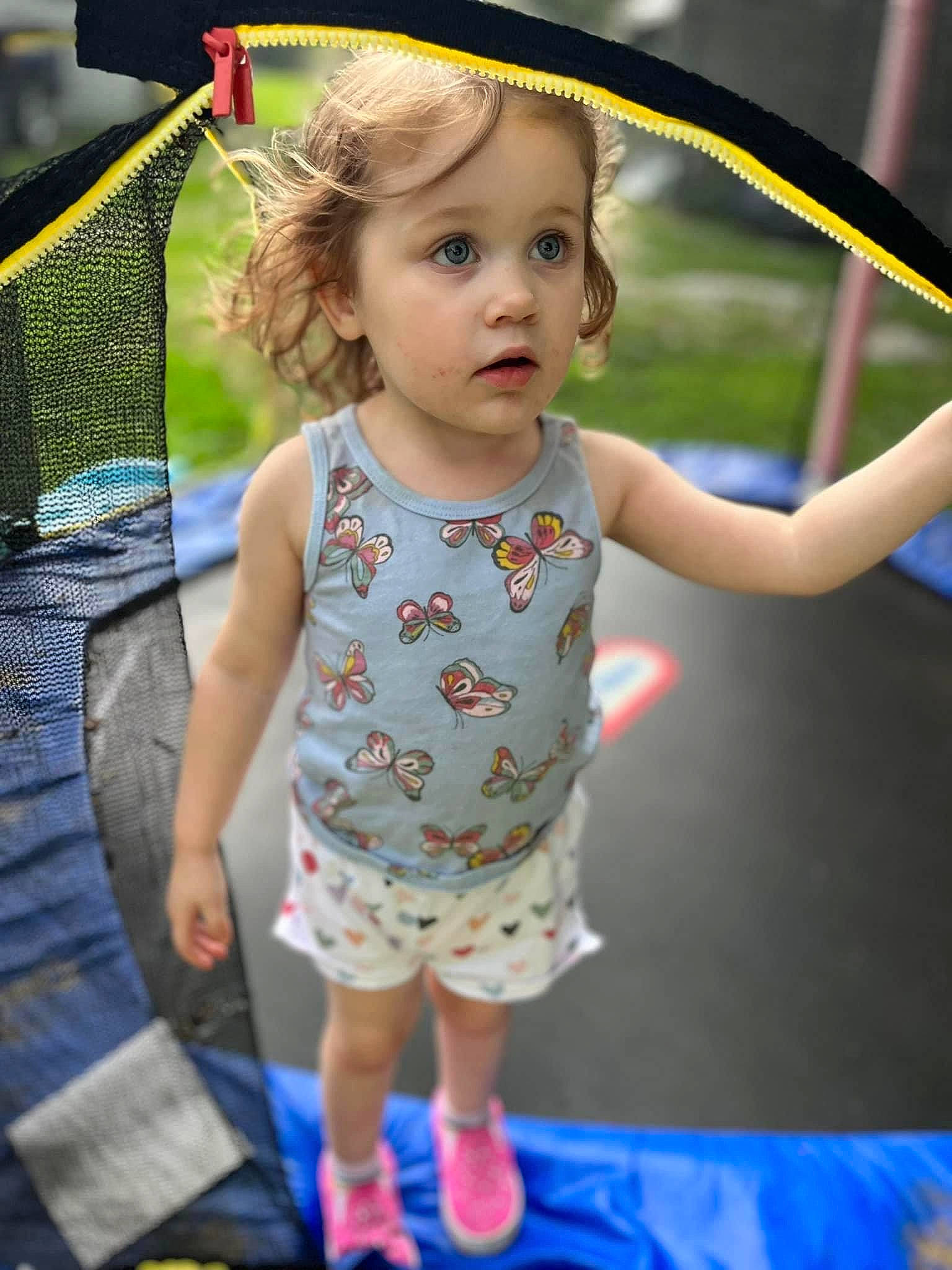 Katelyn joined the competition — help win amazing prizes! baby_toddler_clothing, blue, child, cool, eye, face, fun, gesture, grass, green, hairstyle, happy, head, leisure, organ, person, photograph, public_space, skin, surprise