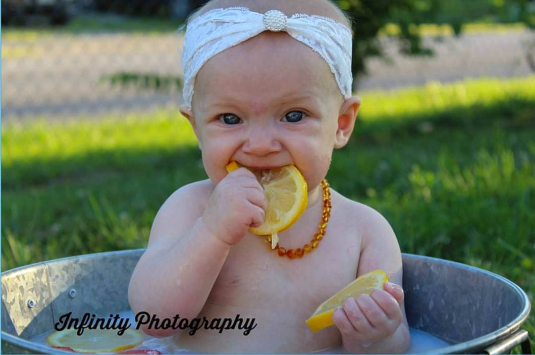 Violet joined the competition — help win amazing prizes! baby, child, finger, food, food_craving, fun, gesture, grass, hand, happy, leisure, natural_foods, nose, person, product, sitting, skin, summer, tableware, thumb