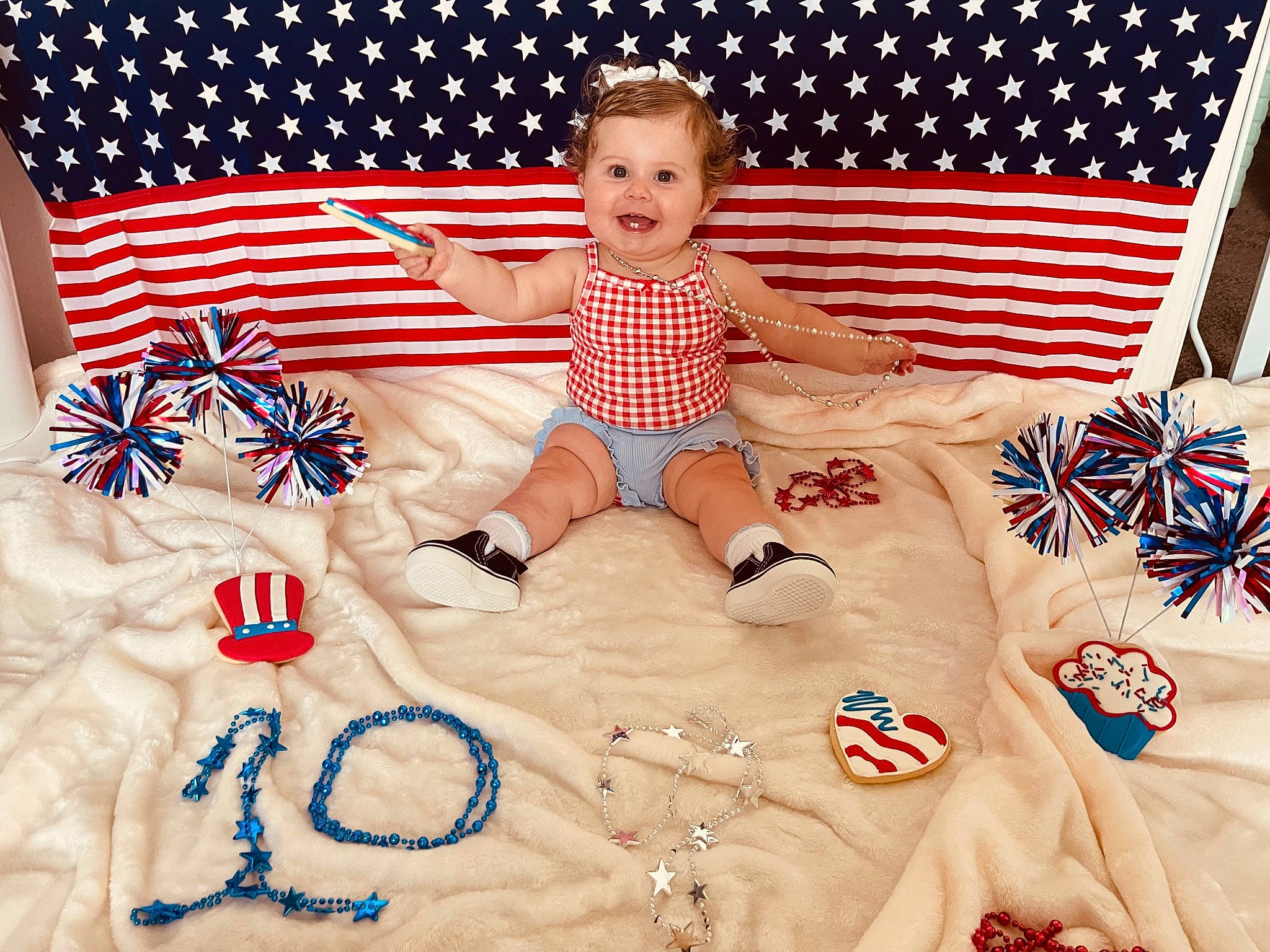 Charlee joined the competition — help win amazing prizes! baby_toddler_clothing, bedding, child, comfort, couch, electric_blue, event, face, flag_of_the_united_states, happy, head, holiday, joy, linens, pattern, person, pillow, sleeve, smile, t_shirt