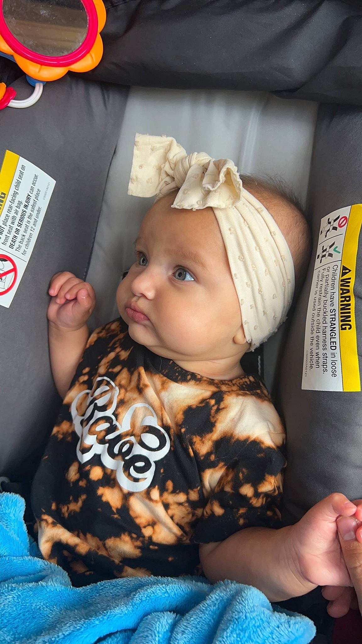 Kori joined the competition — help win amazing prizes! arm, baby, baby_toddler_clothing, cap, cheek, child, comfort, fashion_accessory, fun, fur, hairstyle, happy, headwear, pattern, person, room, sitting, skin, sleeve, textile