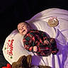 Ace'Lynn joined the competition — help win amazing prizes! baby, infant, plaid_pajamas, blanket, christmas, holiday, stuffed_animal, reindeer, smiling, cute, cozy, indoors, portrait, child, celebration, festive, red, green, soft_toy, lying_down
