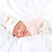 Ace'Lynn is registered to the contest to win money with this photo: newborn, baby, sleeping, hat, pajamas, blanket, white, soft, cute, infant, peaceful, cozy, clothing, resting, portrait, indoors, child, headwear, sleep, bed