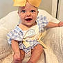 Hadleigh joined the competition — help win amazing prizes! apparel, baby, blanket, blue_eyes, child, clothing, cute, face, foot, hand, happy, indoors, infant, portrait, ribbons, sitting, skin, smiling, white, yellow_bow