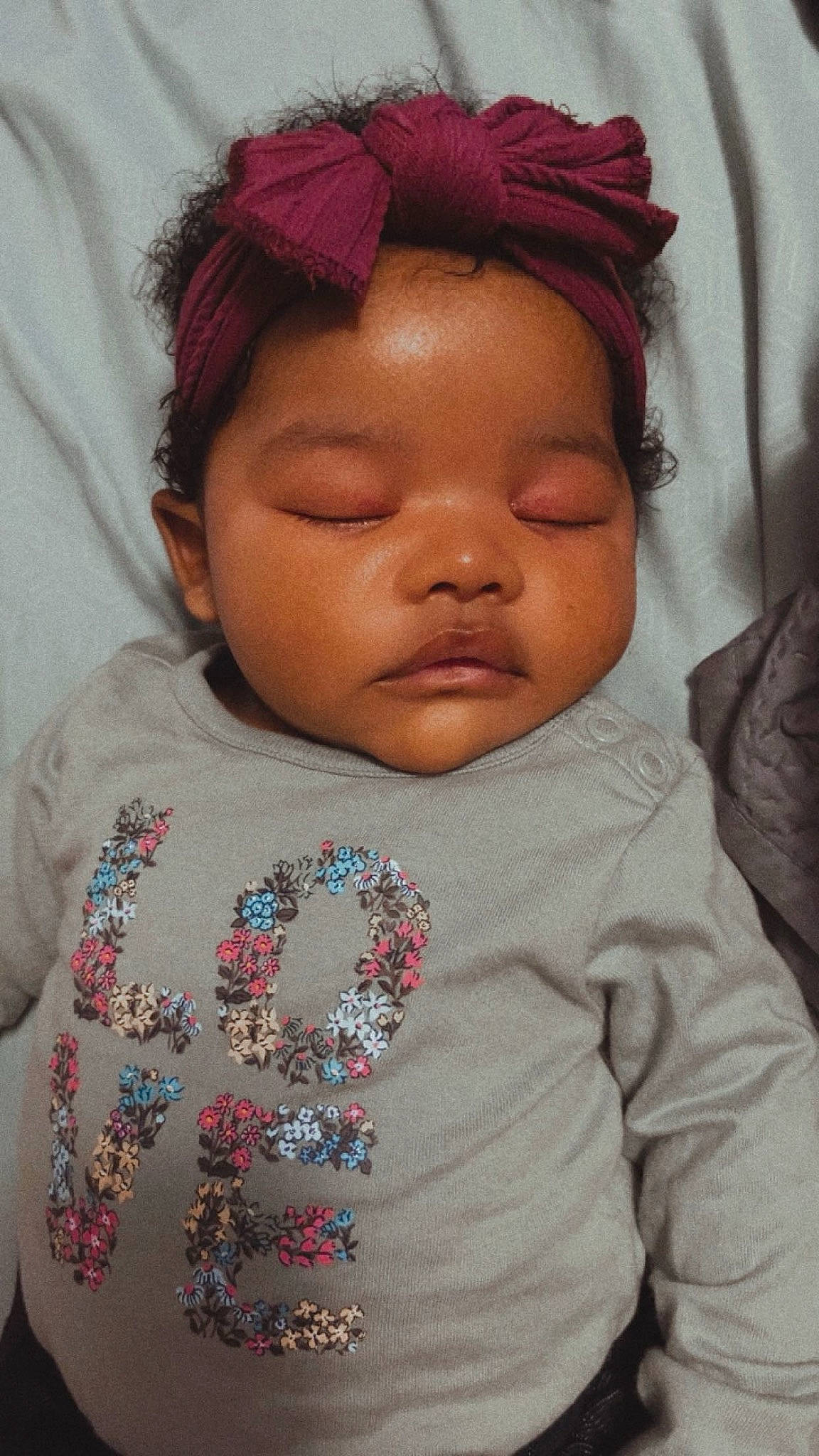 Armani is registered to the contest to win money with this photo: cheek, eye, eyebrow, eyelash, face, facial_expression, forehead, happy, head, human_body, iris, lip, mouth, neck, nose, person, pink, skin, sleeve, smile