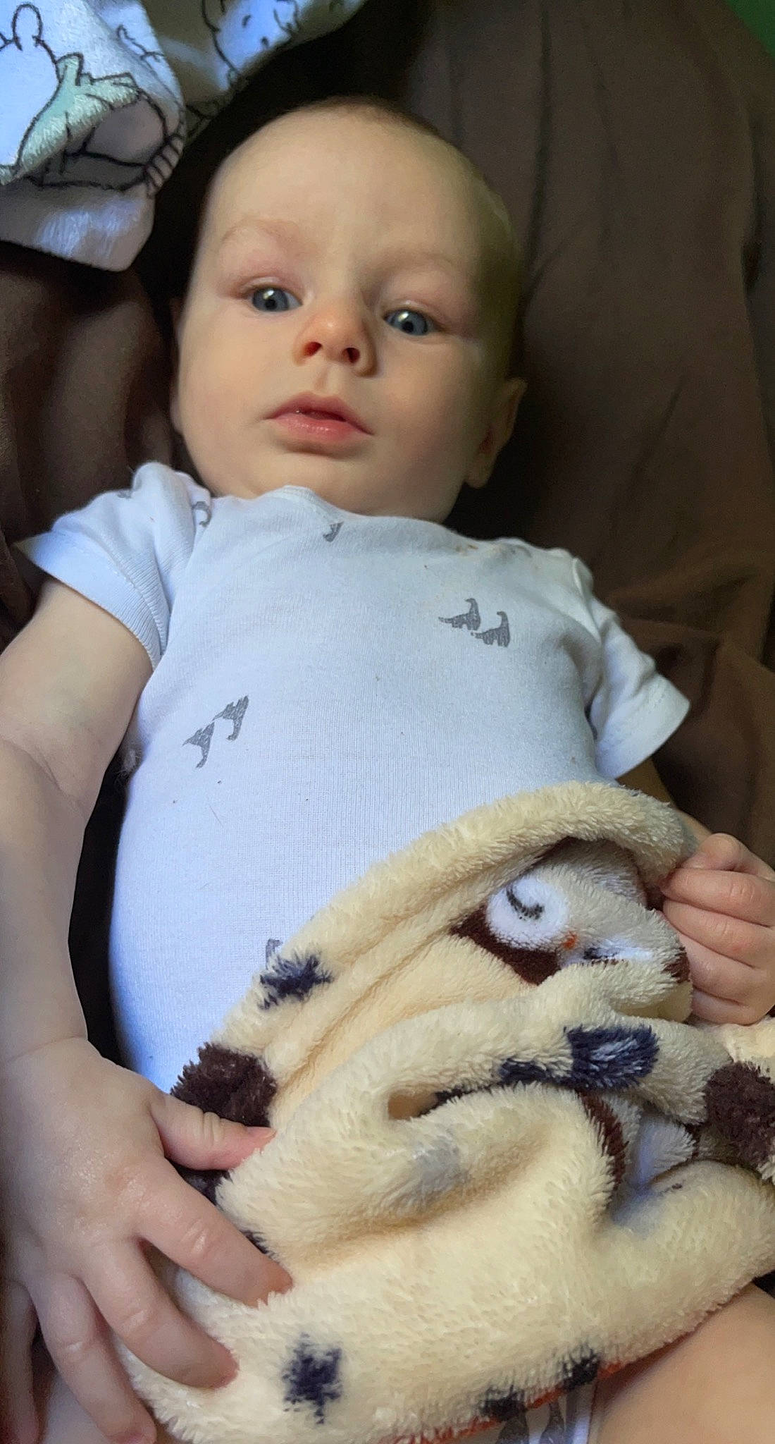 Wyatt is registered to the contest to win money with this photo: baby, baby_toddler_clothing, child, comfort, facial_expression, finger, hand, human, linens, mammal, nail, nose, organ, people, person, skin, terrestrial_animal, textile, toddler, toy