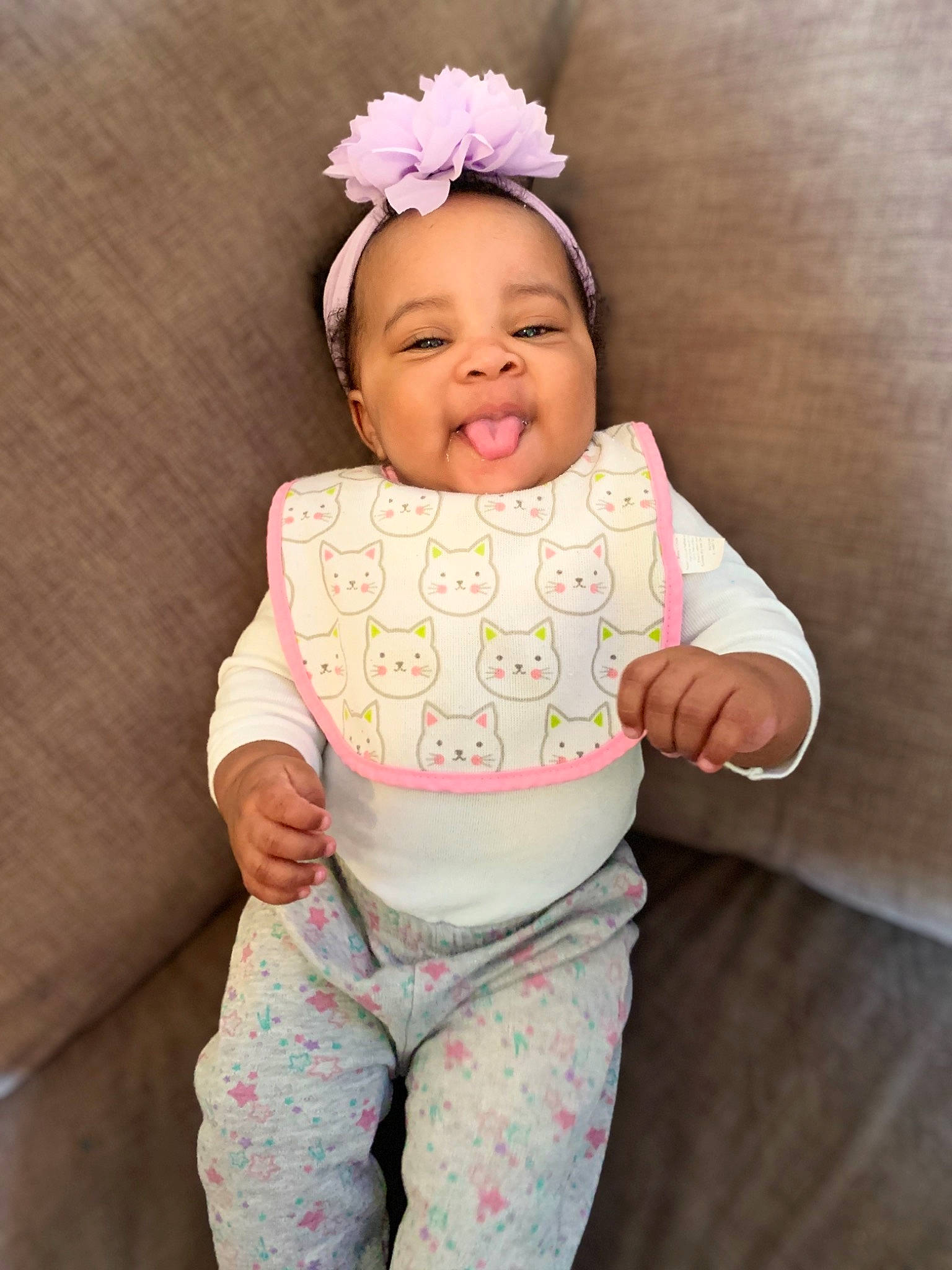Jamayah is registered to the contest to win money with this photo: arm, baby, baby_toddler_clothing, cheek, dress, eye, face, hand, happy, head, human_body, leg, lip, neck, person, pink, skin, sleeve, smile, textile