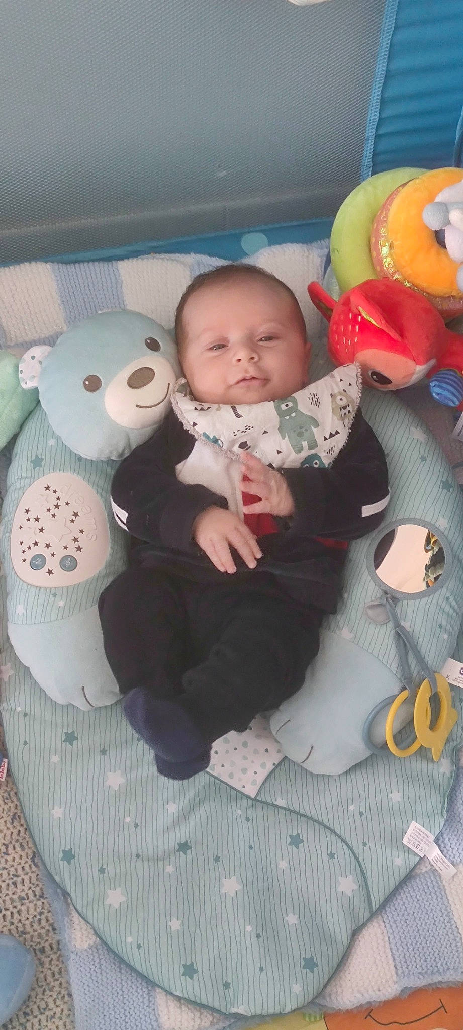 Manoa participe au concours pour gagner de l'argent avec cette photo : baby, baby_carriage, baby_products, baby_toddler_clothing, baby_toys, cheek, child, comfort, head, lap, linens, person, play, room, sitting, skin, sock, stuffed_toy, textile, toddler