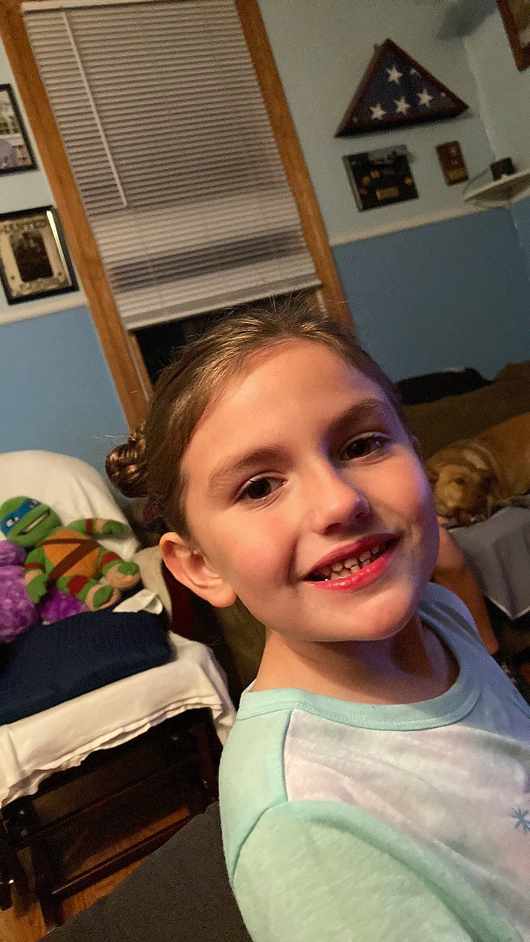 Lily-mae is registered to the contest to win money with this photo: brown_hair, chair, cheek, child, chin, ear, eyebrow, eyelash, fun, hair_coloring, happy, jaw, joy, laugh, long_hair, person, picture_frame, room, smile, t_shirt