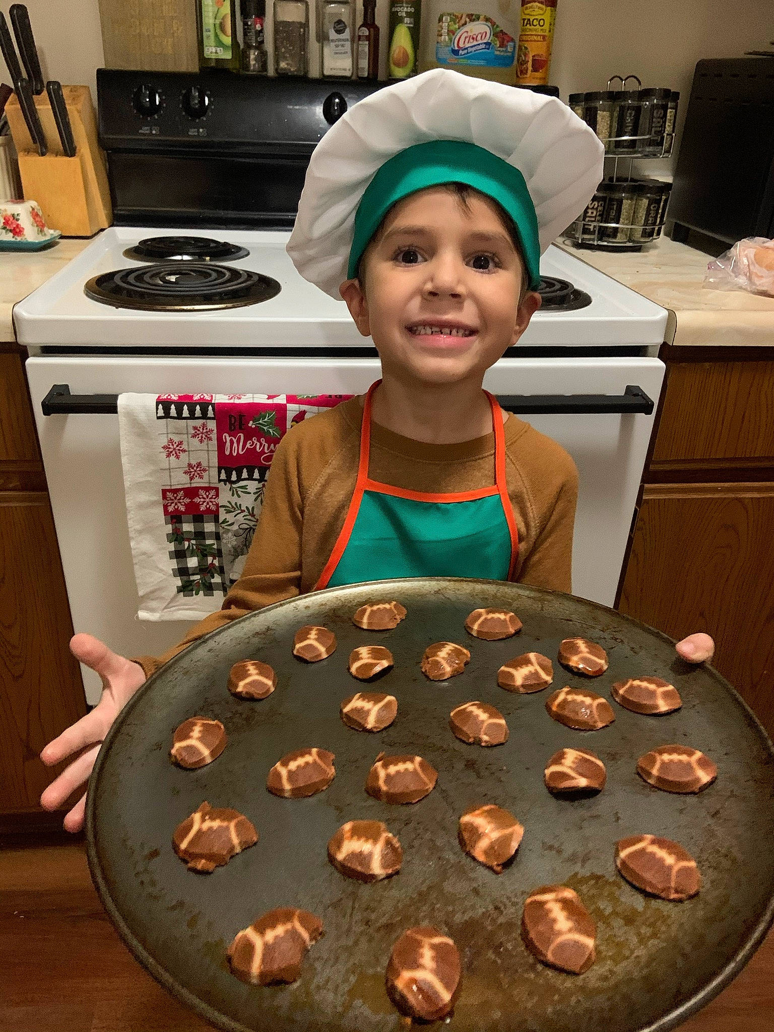Landen joined the competition — help win amazing prizes! baked_goods, baking, cap, chair, cooking, cooktop, cuisine, dessert, eyewear, finger_food, food, gas_stove, headwear, home_appliance, joy, kitchen_appliance, kitchen_stove, person, smile, sweetness