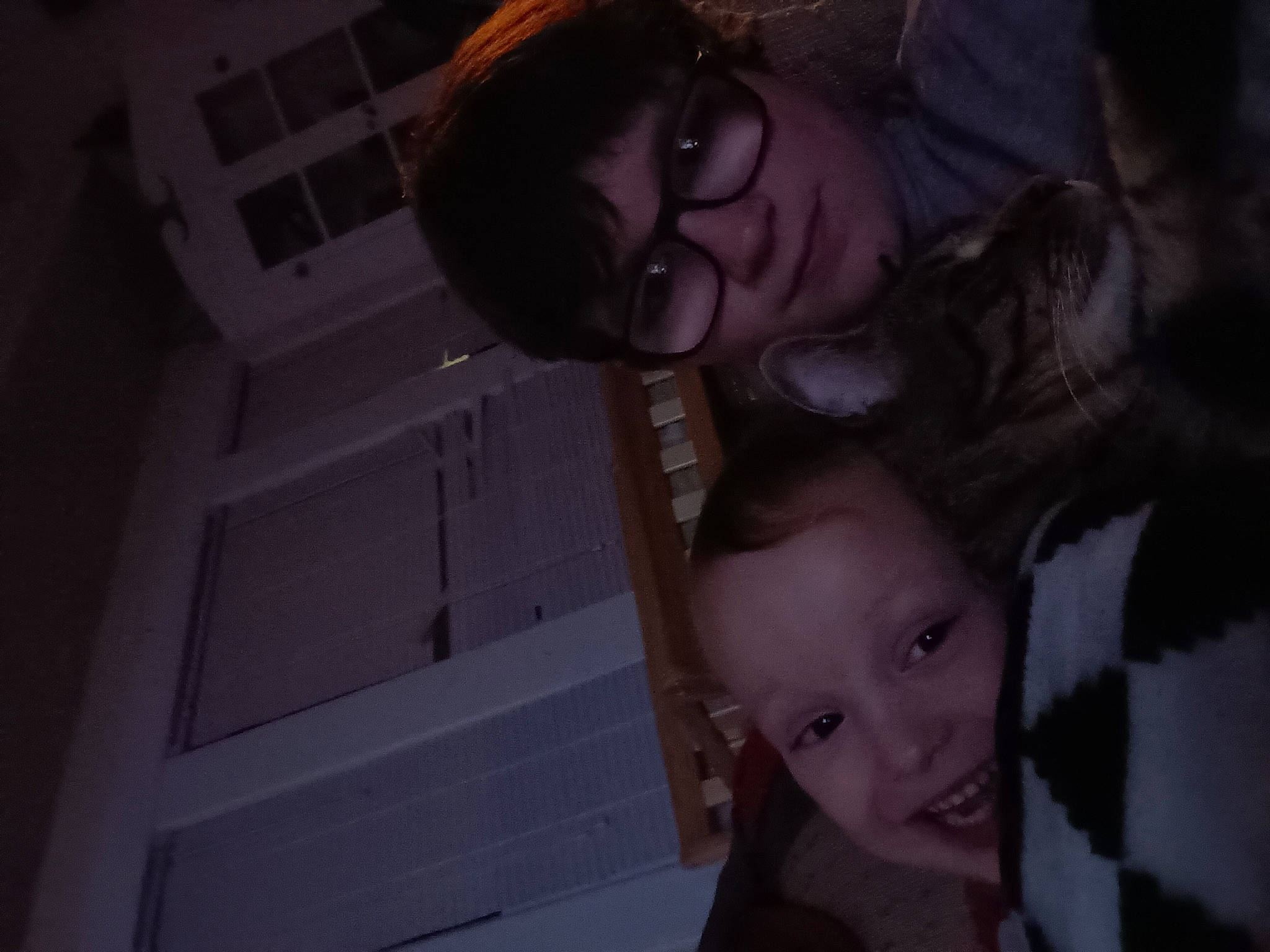 Charles is registered to the contest to win money with this photo: baby, black_hair, child, darkness, ear, eyebrow, facial_expression, flash_photography, fun, fur, gesture, happy, head, joy, monochrome, mouth, night, nose, person, room