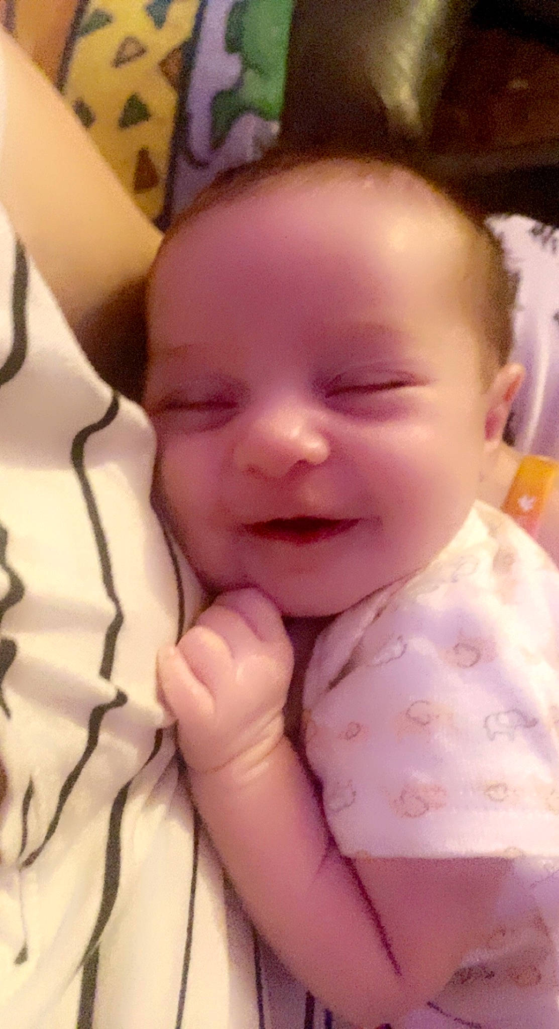 Sarai is registered to the contest to win money with this photo: baby, baby_toddler_clothing, beauty, cheek, comfort, eyebrow, eyelash, finger, gesture, happy, iris, lip, mouth, nose, person, pink, skin, sleeve, smile, thumb