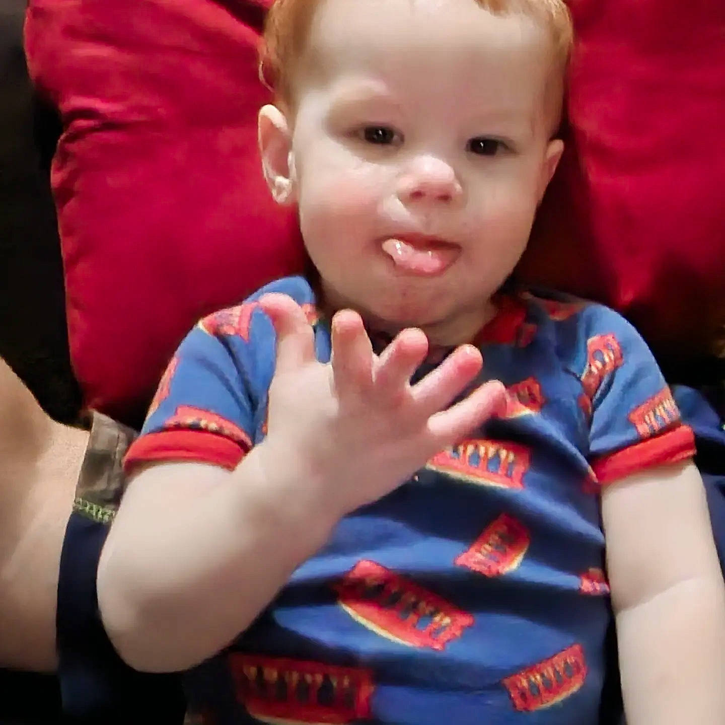 Everett is registered to the contest to win money with this photo: arm, baby, baby_toddler_clothing, cheek, ear, elbow, face, finger, fun, gesture, hand, happy, head, muscle, nose, person, sleeve, smile, t_shirt, thumb