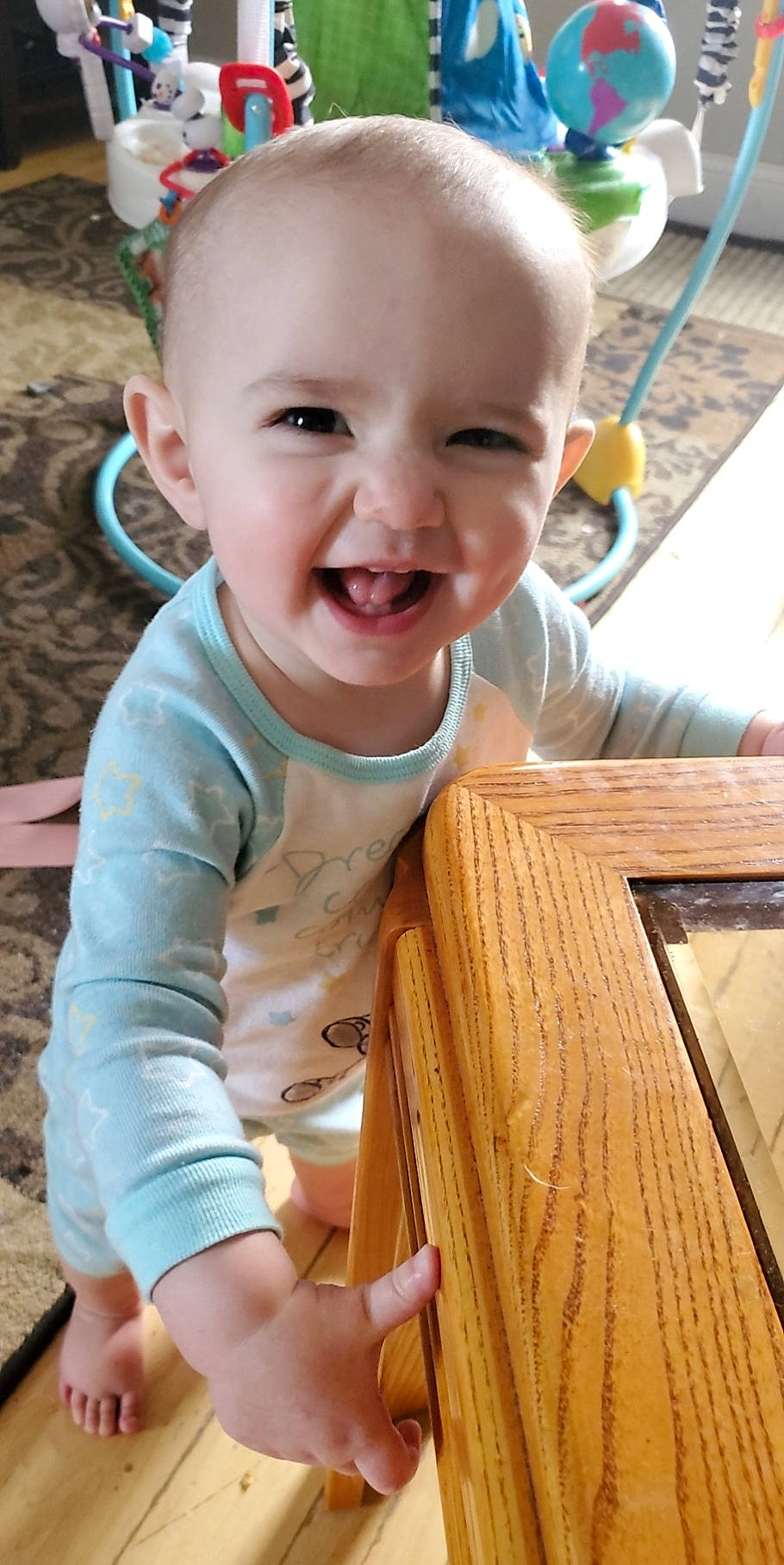 Kenna joined the competition — help win amazing prizes! baby_toddler_clothing, cheek, eye, facial_expression, finger, green, happy, head, iris, mouth, nose, organ, person, photograph, product, skin, sleeve, smile, standing, white