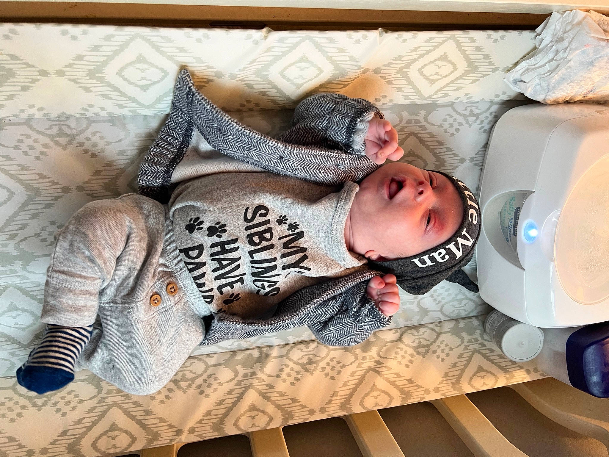 Beckham joined the competition — help win amazing prizes! baby, baby_products, baby_sleeping, baby_toddler_clothing, beanie, bedding, bedtime, child, comfort, headwear, knit_cap, linens, nap, pattern, person, personal_protective_equipment, room, sitting, sleeve, textile