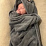 Soan participe au concours pour gagner de l'argent avec cette photo : baby, sleeping, towel, gray, hooded_towel, thumb_sucking, infant, wrapped, cozy, soft, cute, child, peaceful, resting, indoors, blanket, comfort, portrait, closeup, newborn