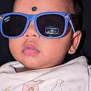 Hiyansh joined the competition — help win amazing prizes! baby, child, sunglasses, blue_sunglasses, mickey_mouse, face, black_dot, shirt, cartoon_animals, pig, duck, goose, closeup, portrait, cute, fashion, infant, clothing, person, head