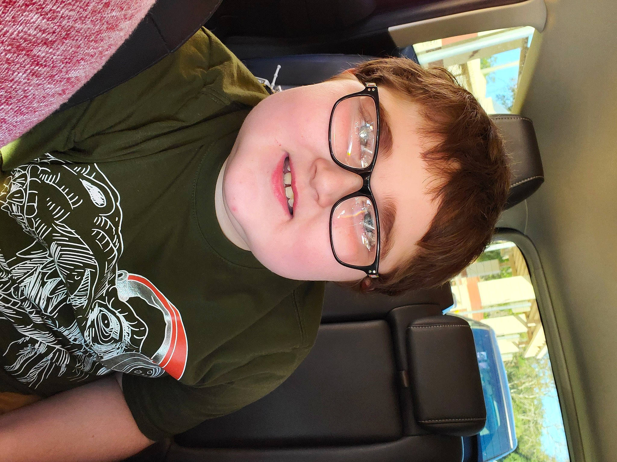 Frankie joined the competition — help win amazing prizes! arm, black_hair, car_seat, comfort, cool, ear, eyewear, fun, glasses, head, mouth, nap, neck, person, sitting, sleep, smile, vacation