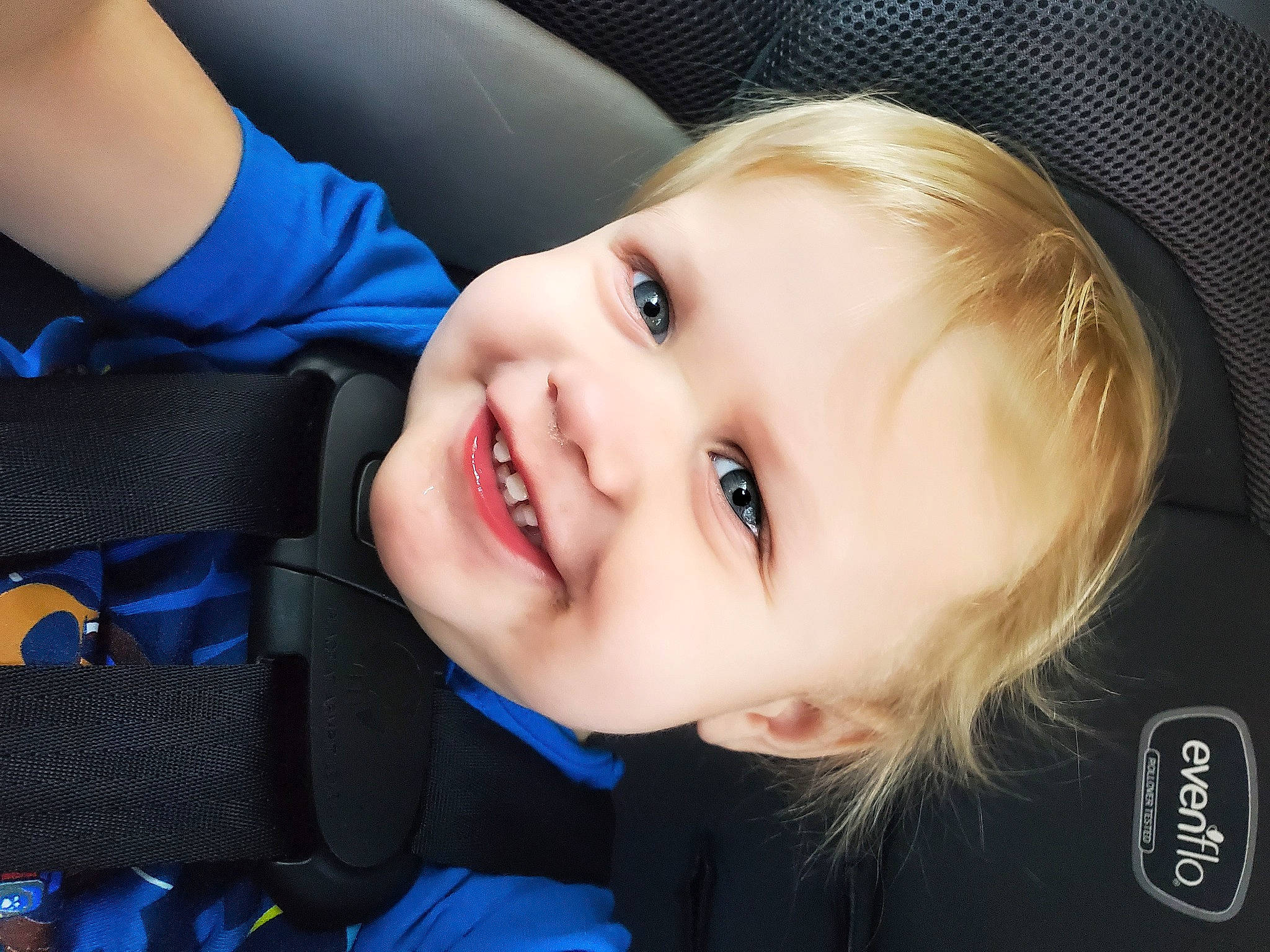 Bjorn is registered to the contest to win money with this photo: auto_part, baby, blond, blue, cheek, child, electric_blue, eyelash, facial_expression, flash_photography, fun, hairstyle, happy, iris, joy, lip, mouth, nose, person, skin