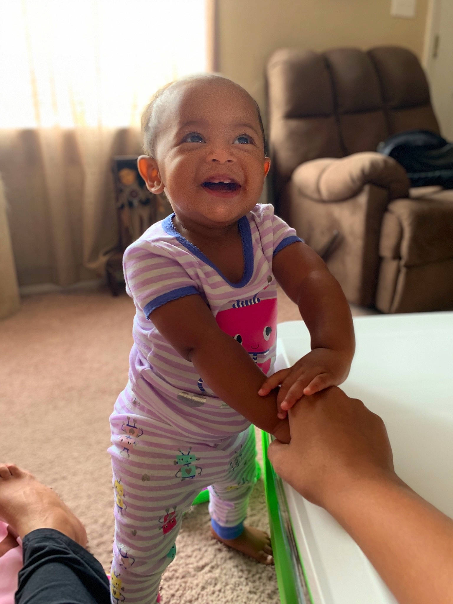 Audrina joined the competition — help win amazing prizes! arm, baby, cheek, child, face, facial_expression, fun, happy, head, leg, person, play, room, sitting, skin, smile, toddler, vacation