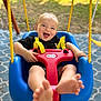baby, face, grass, happy, head, laughing, nature, outdoorplayarea, outdoors, park, person, photography, plant, playarea, portrait, sitting, summer, swing, toy, tree