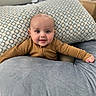 Lawton joined the competition — help win amazing prizes! baby, infant, smiling, face, eyes, hands, pillow, blanket, bedroom, indoors, cozy, clothing, child, cute, portrait, soft, warm, comfort, person, head