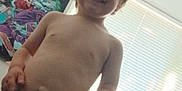 Jeff joined the competition — help win amazing prizes! toddler, child, smiling, indoor, shirtless, portrait, happy, window, blinds, artwork, hair, face, skin, person, home, light, daylight, room, expression, cute