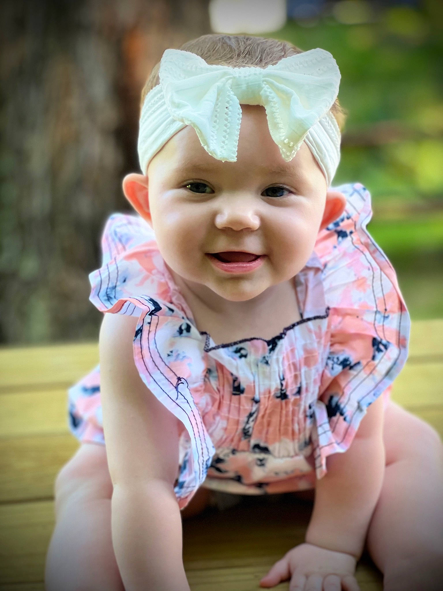 Emmerson joined the competition — help win amazing prizes! baby, baby_toddler_clothing, cap, cheek, child, eye, fashion_accessory, flash_photography, fun, grass, happy, hat, headband, people_in_nature, person, pink, sitting, skin, sleeve, smile