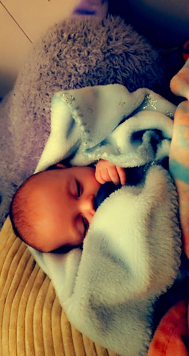 Kylin is registered to the contest to win money with this photo: baby, baby_sleeping, baby_toddler_clothing, cheek, child, cloud, comfort, eyebrow, facial_expression, finger, gesture, happy, head, lip, mammal, mouth, nose, person, skin, toddler