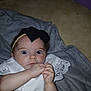 Lilly joined the competition — help win amazing prizes! baby, child, wide_eyes, black_bow, headband, white_dress, lace_collar, blanket, floor, indoor, portrait, infant, hands, cute, expression, skin, person, young, sitting, clothing