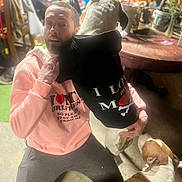 Duelly is registered to the contest to win money with this photo: adult, animal, canine, clothing, dog, face, hat, head, hound, male, man, pants, person, pet, photography, plant, portrait, pottedplant, puppy, t_shirt