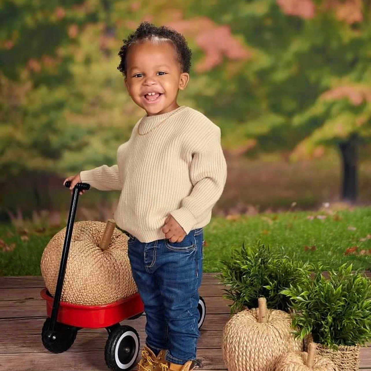 Tien is registered to the contest to win money with this photo: boy, child, clothing, e_scooter, face, happy, head, jeans, knitwear, maceclub, male, pants, person, sitting, sleeve, smile, sweater, transportation, vehicle, weapon