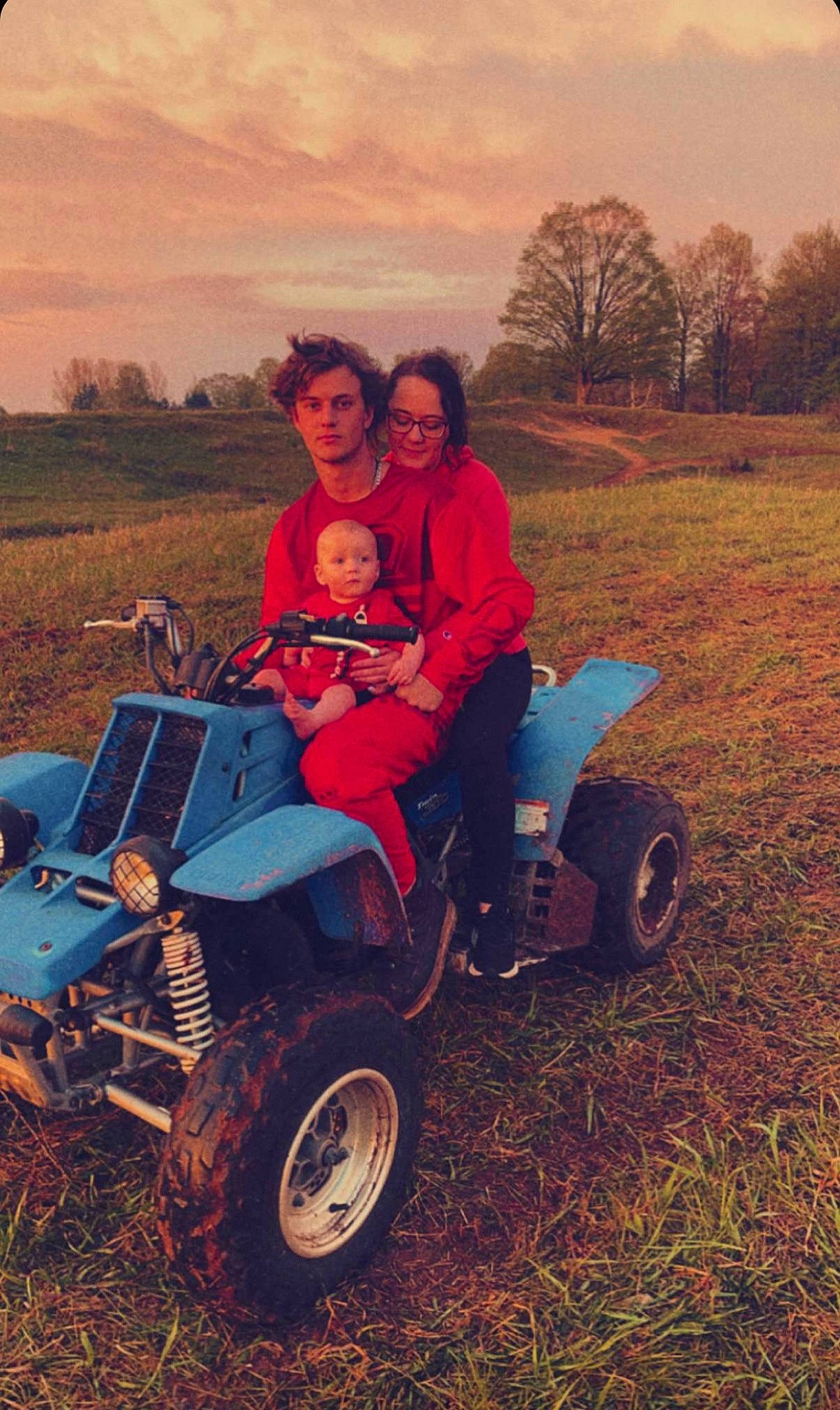 Elliot is registered to the contest to win money with this photo: automotive_design, automotive_exterior, automotive_tire, bumper, cloud, ecoregion, fender, human_body, jacket, motor_vehicle, people_in_nature, person, plant, sky, t_shirt, tire, tread, tree, vehicle, wheel