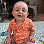 Wesley joined the competition — help win amazing prizes! baby, backyard, blanket, casual_clothing, child, cute, drool, furniture, happy, infant, orange_shirt, outdoor, person, playful, portrait, sitting, smiling, summer, toy, young