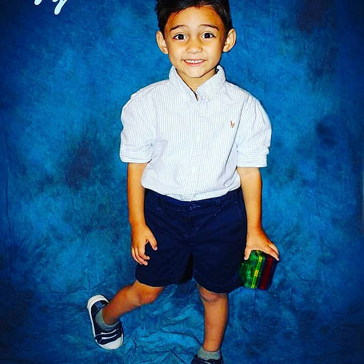 Tyten joined the competition — help win amazing prizes! active_shorts, bermuda_shorts, blue, calf, child_model, collar, cool, electric_blue, facial_expression, flash_photography, joy, knee, majorelle_blue, person, pleased, pocket, shirt, shorts, sleeve, standing