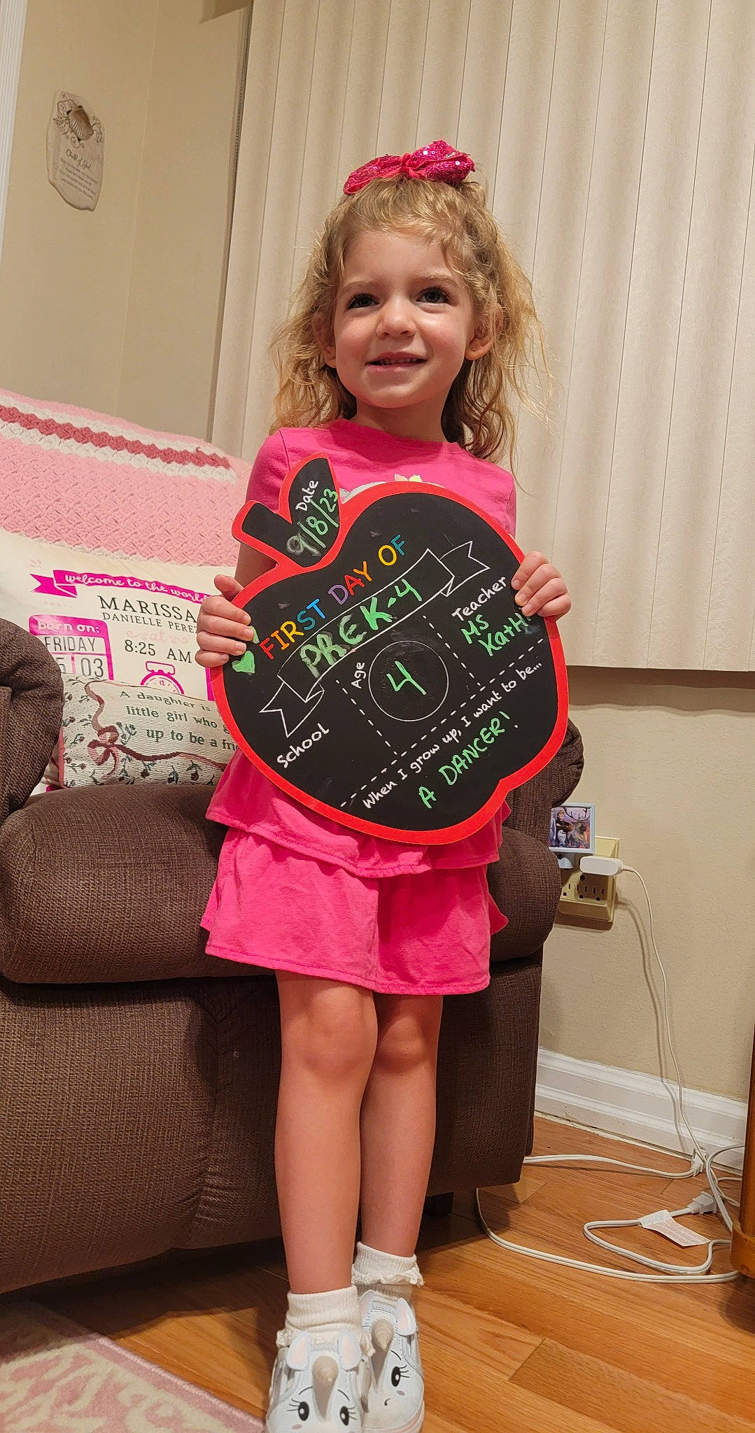 Marissa joined the competition — help win amazing prizes! arm, chair, event, fun, hair, hairstyle, happy, human_body, human_leg, joy, magenta, neck, pattern, person, pink, shoulder, sleeve, smile, thigh, toddler