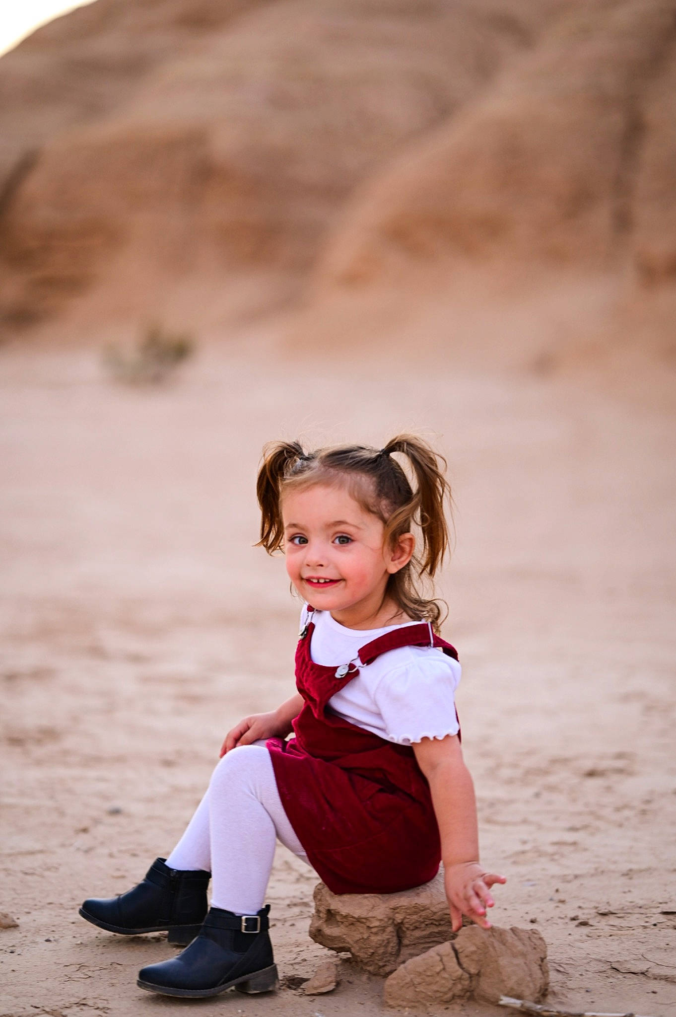 Hazel joined the competition — help win amazing prizes! aeolian_landform, boot, brown_hair, flash_photography, footwear, fun, grass, happy, human_leg, joy, knee, landscape, leisure, people_in_nature, person, sandal, shoe, sitting, smile, sneakers