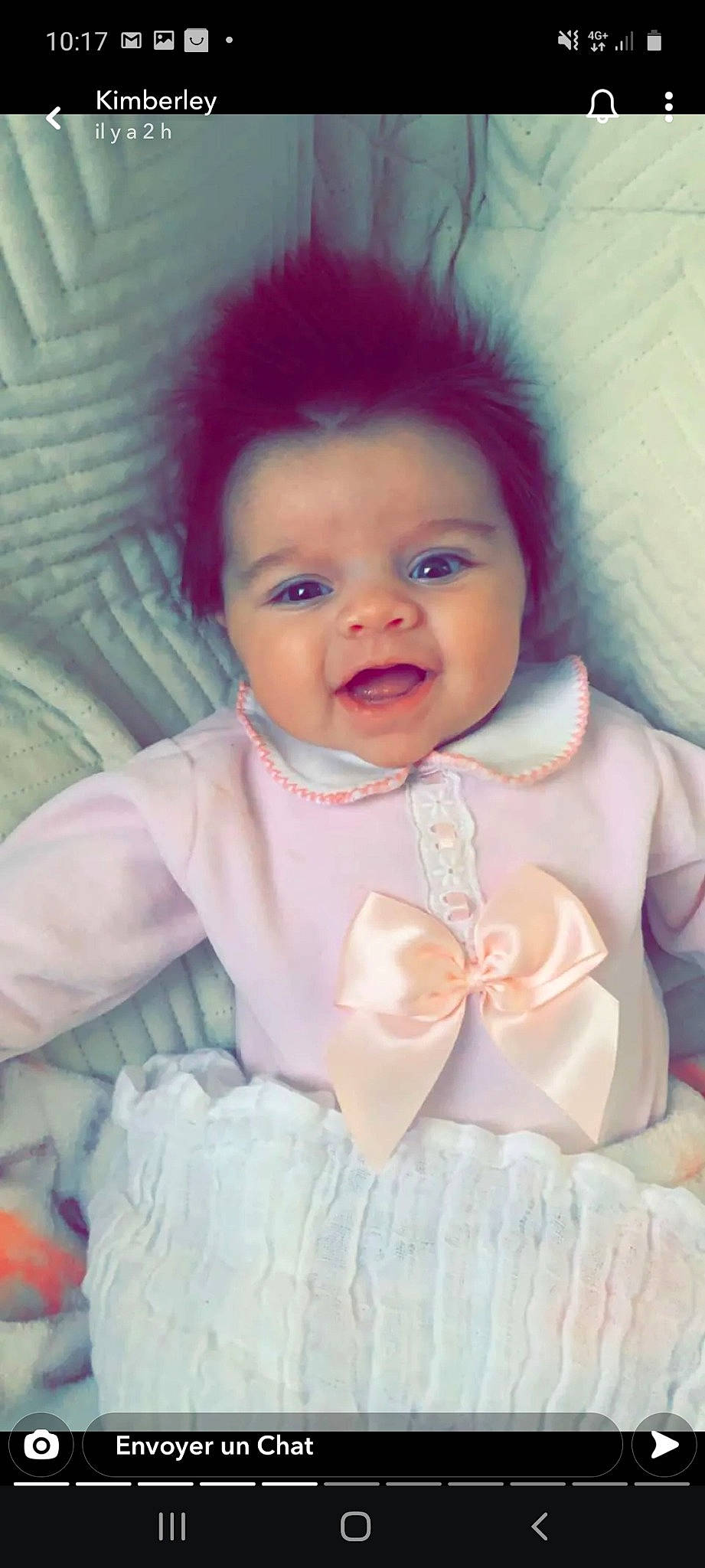 Djeen participe au concours pour gagner de l'argent avec cette photo : baby, baby_toddler_clothing, cheek, child, dress, eyelash, happy, iris, linens, lip, neck, nose, organ, outerwear, person, pink, product, skin, sleeve, smile