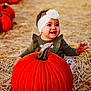 baby, child, pumpkin, headband, flower, smiling, straw, fall, autumn, orange, cute, sitting, outdoor, harvest, holiday, seasonal, happy, person, portrait, festival