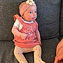 Luna participe au concours pour gagner de l'argent avec cette photo : baby, infant, pink_headband, flower, pink_dress, cartoon_deer, couch, gray_couch, tights, sitting, tongue_out, hand, person, child, cute, indoors, fabric, clothing, skin, playful
