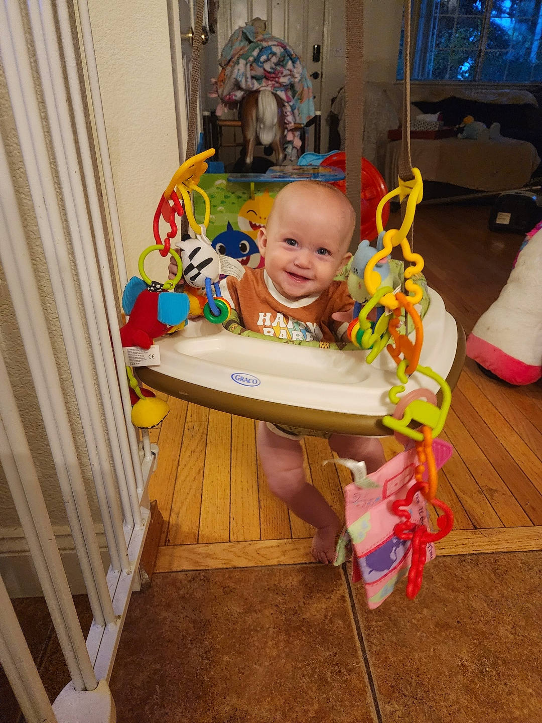 Tilly is registered to the contest to win money with this photo: art, baby, baby_products, baby_safety, baby_toys, child, curtain, flooring, fun, hairstyle, happy, hardwood, joy, leisure, person, picture_frame, play, product, sitting, smile