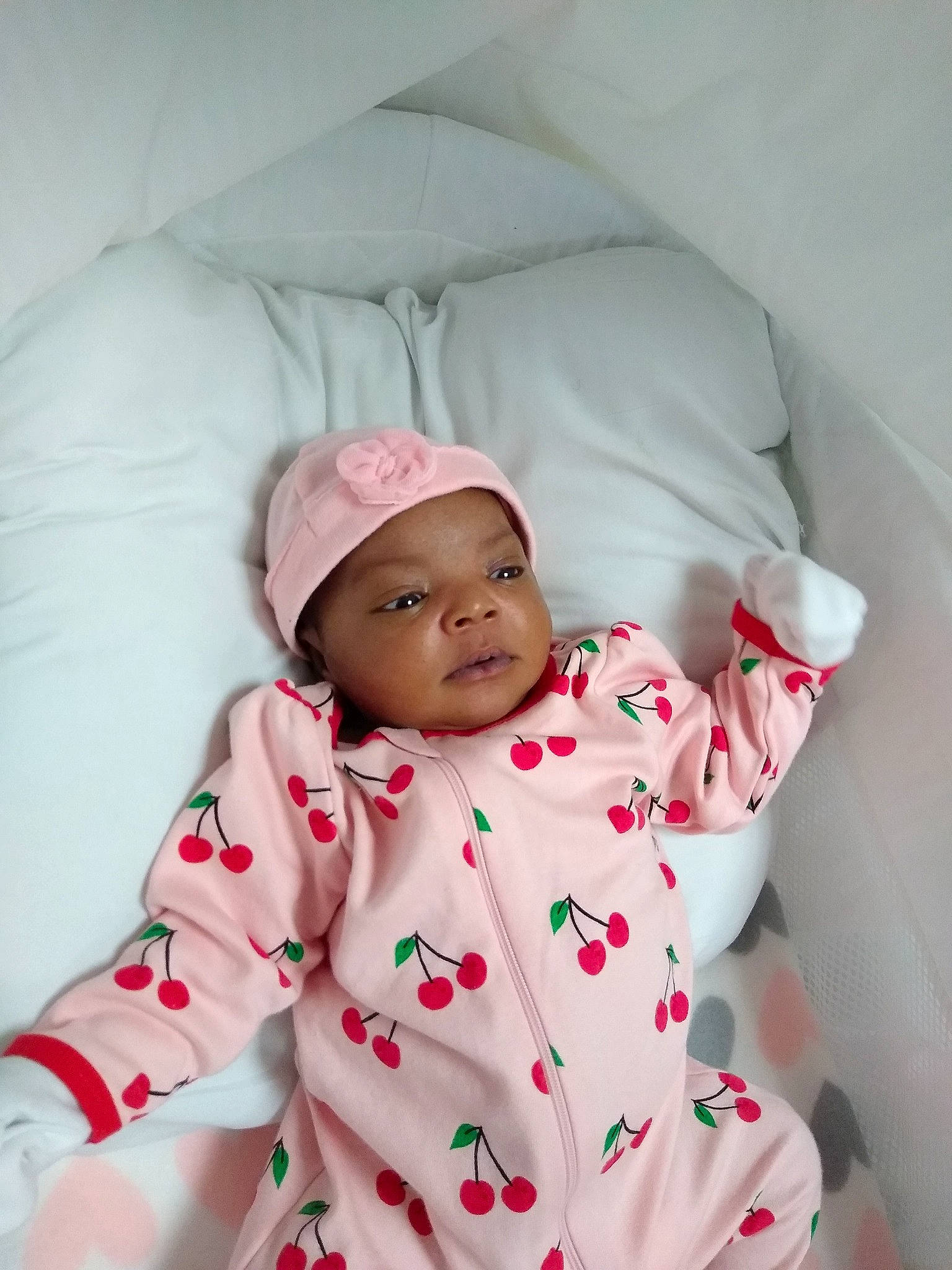 Teagan is registered to the contest to win money with this photo: baby, baby_sleeping, child, head, linens, outerwear, person, pink, skin, smile, textile, toddler, white