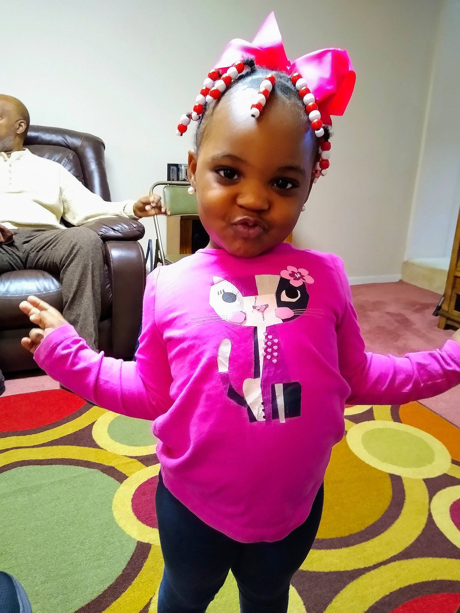 Tori is registered to the contest to win money with this photo: child, costume, ear, hair_accessory, head, magenta, party, person, pink, play, room, toddler