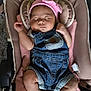 Siana participe au concours pour gagner de l'argent avec cette photo : baby, sleeping, denim_overalls, pink_headband, bow, baby_seat, blanket, cushion, infant, cute, peaceful, indoor, soft_lighting, clothing, footwear, human, portrait, child, resting, adorable