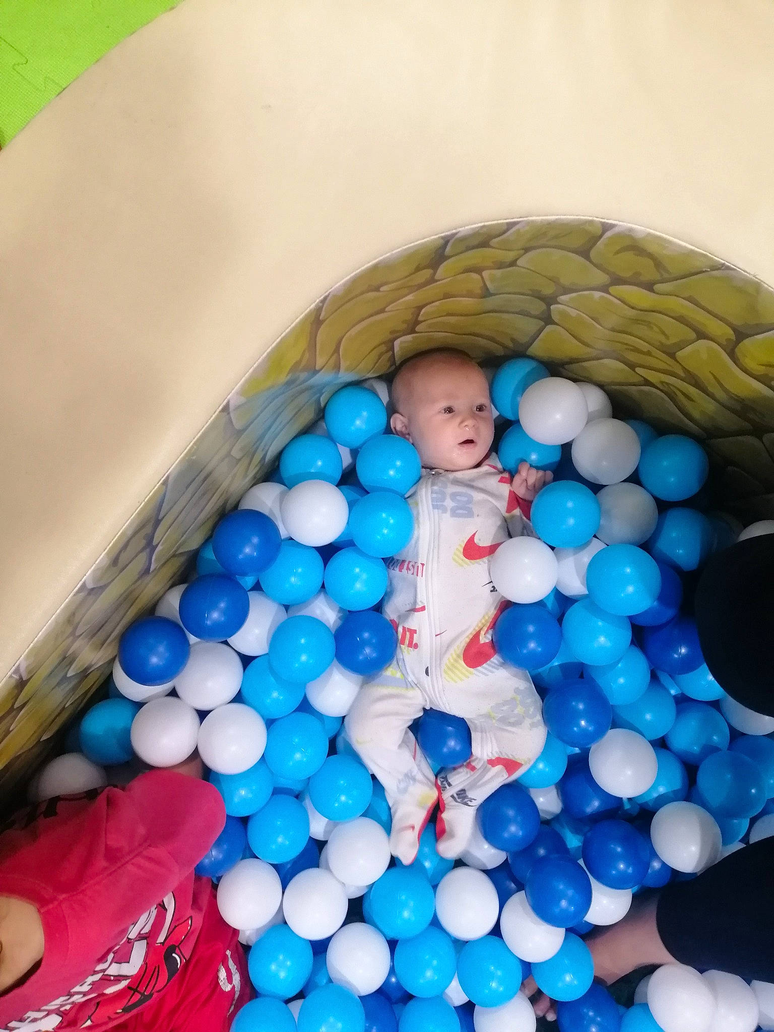 Stefan is registered to the contest to win money with this photo: baby_products, baby_toys, ball, ball_pit, balloon, child, circle, electric_blue, fun, party_supply, pattern, person, plastic, play, recreation, toddler, toy