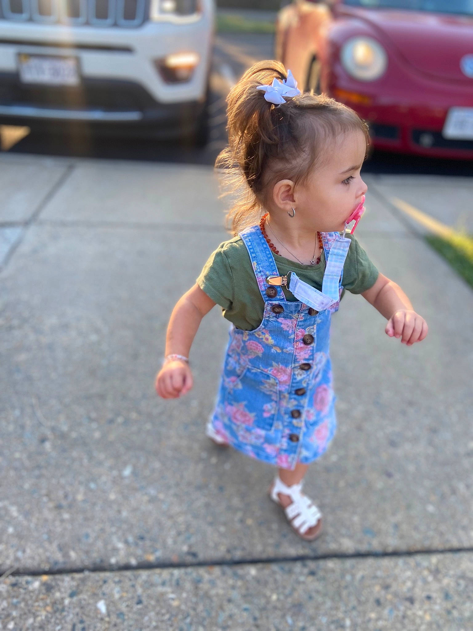 Kinsley joined the competition — help win amazing prizes! asphalt, automotive_exterior, automotive_lighting, car, child, fun, happy, leisure, motor_vehicle, pedestrian, person, recreation, road, road_surface, sidewalk, smile, t_shirt, toddler, vehicle, vehicle_door