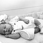 Easton participe au concours pour gagner de l'argent avec cette photo : baby, sleeping, infant, overalls, socks, crib, blanket, soft, peaceful, resting, monochrome, portrait, child, newborn, cute, cozy, relaxed, indoor, clothing, babywear