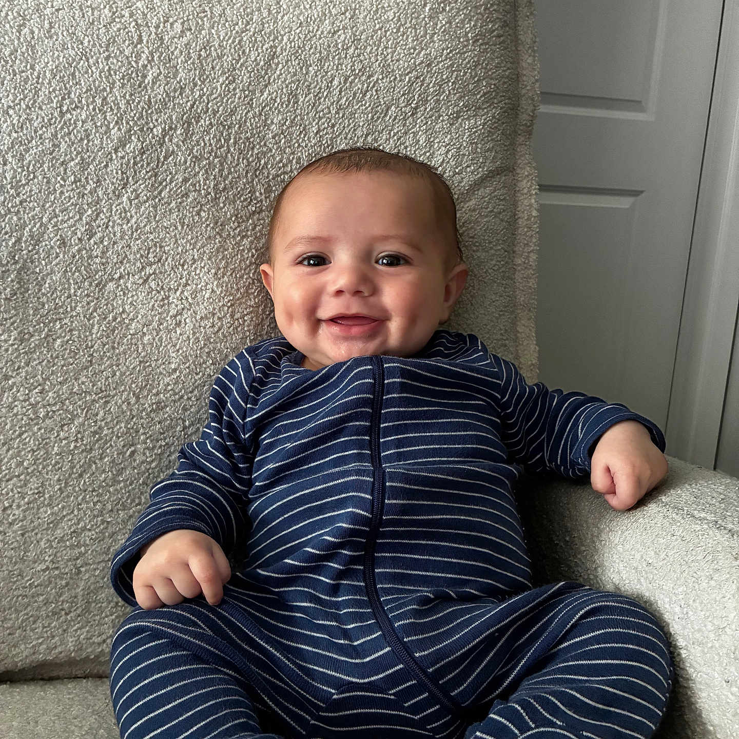 Kaleio joined the competition — help win amazing prizes! armchair, baby, child, cozy, cute, dimple, furniture, happy, home, indoor, infant, onesie, person, portrait, relaxed, seated, smiling, soft_texture, striped_clothing, young_child