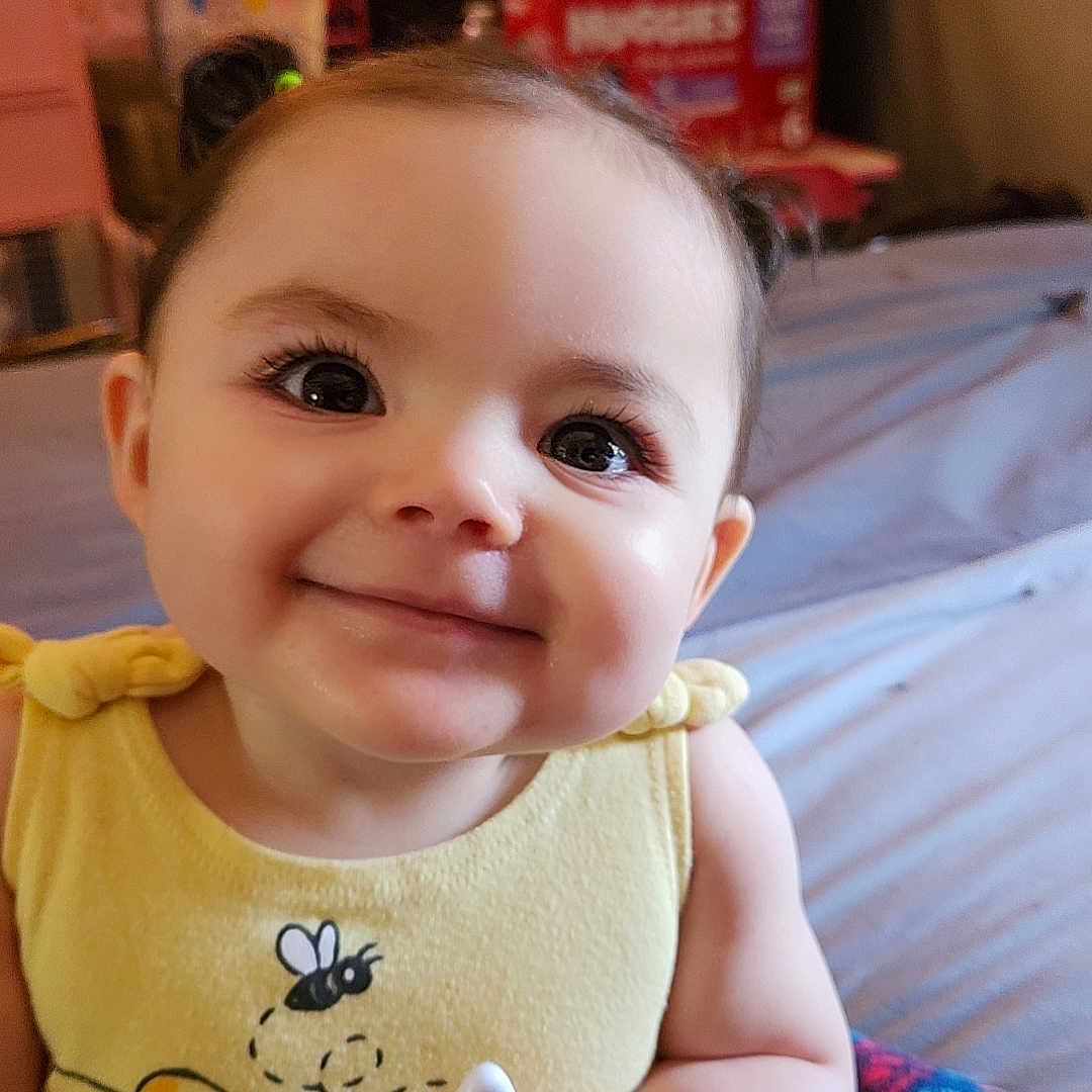 Kaiya joined the competition — help win amazing prizes! baby, background, bed, bee_design, child, colorful_pants, cute, drawer, eyes, face, furniture, hand, happy, indoor, lamp, pigtails, room, smile, spoon, yellow_outfit